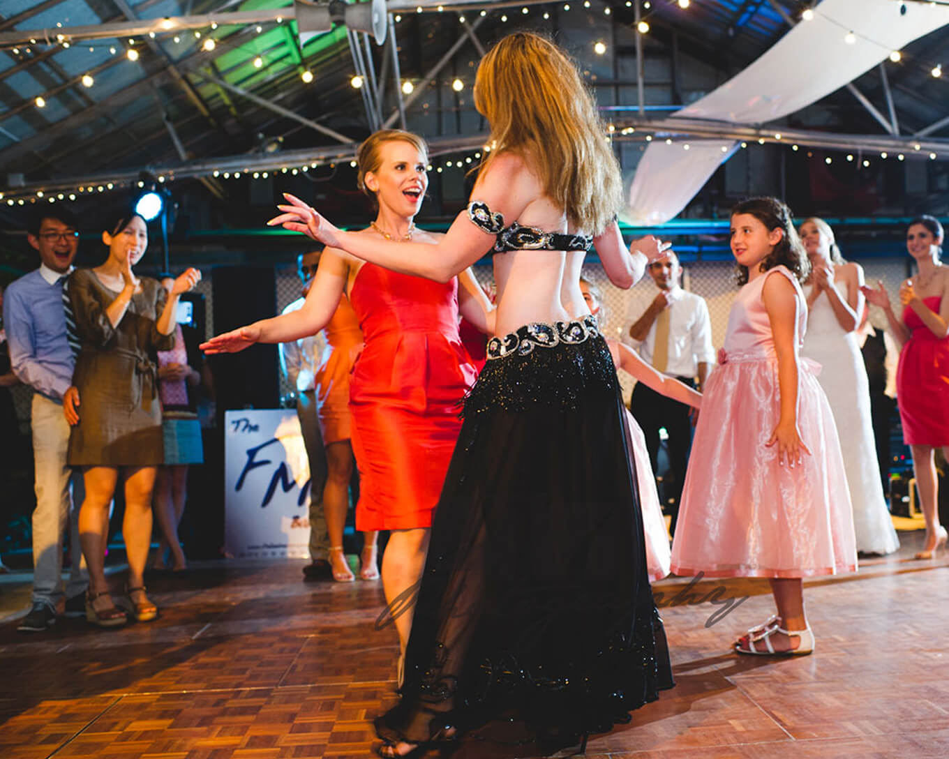 Donna performing one of her belly dance routines at an event