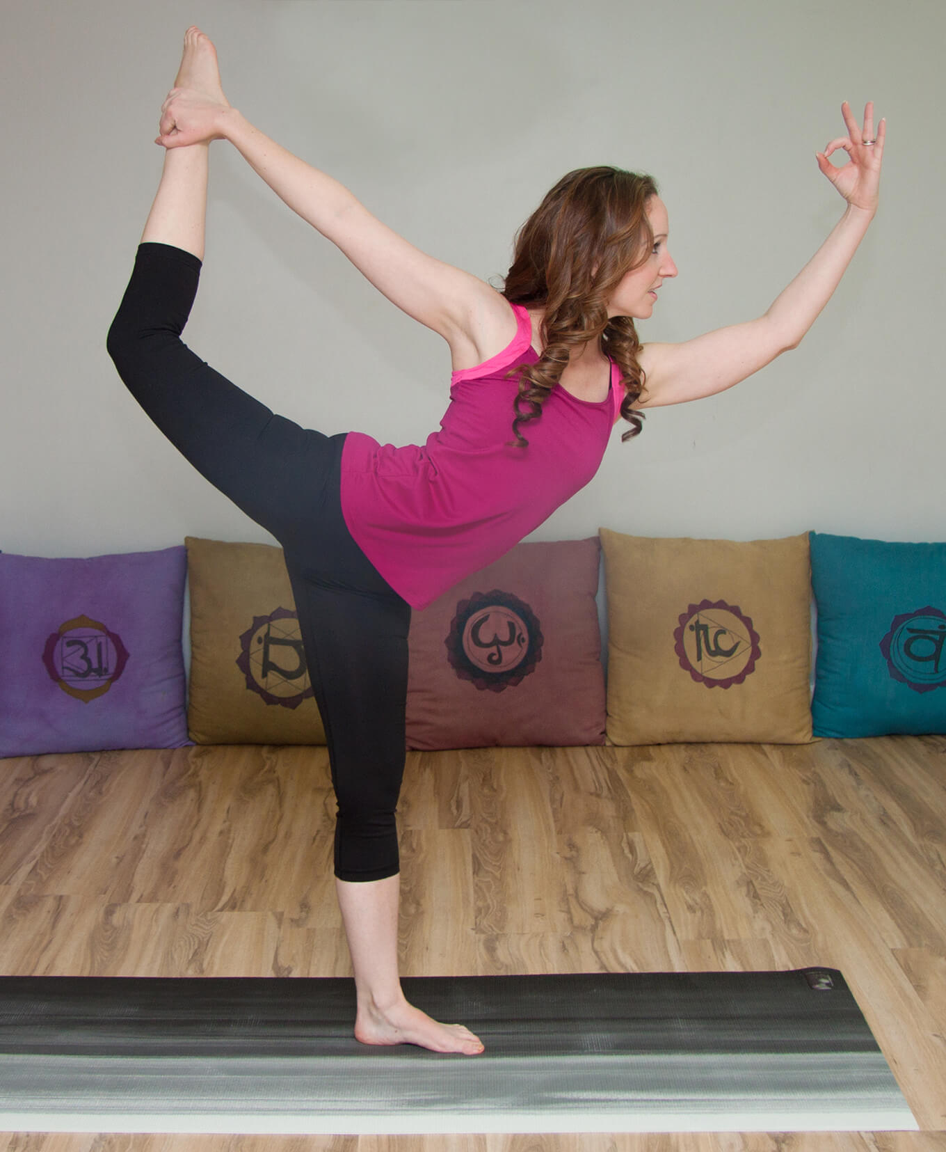 Donna showing a dancer yoga pose